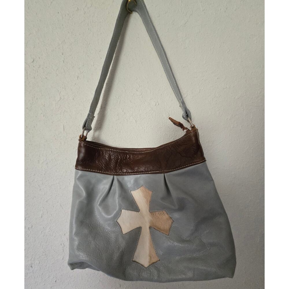 Blue leather purse with cross accent
